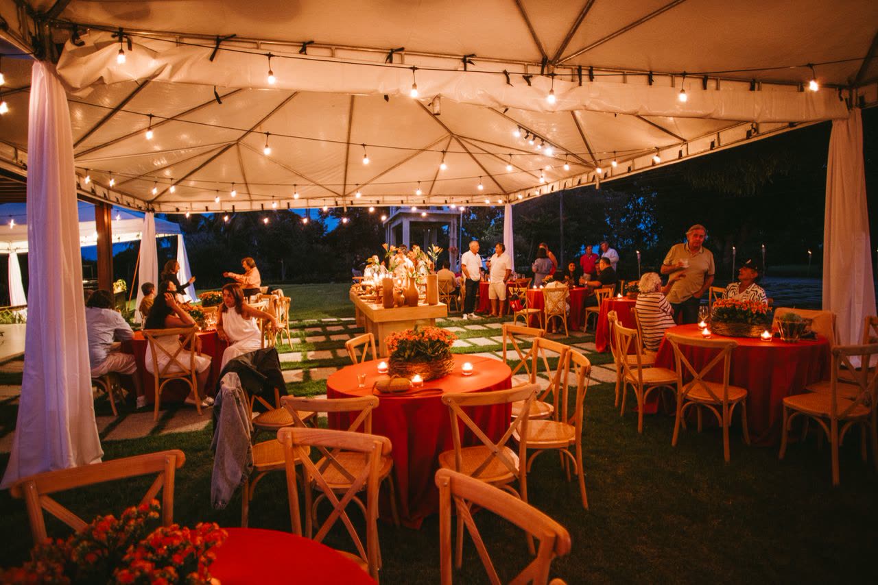 Evening tented wedding reception from a distance